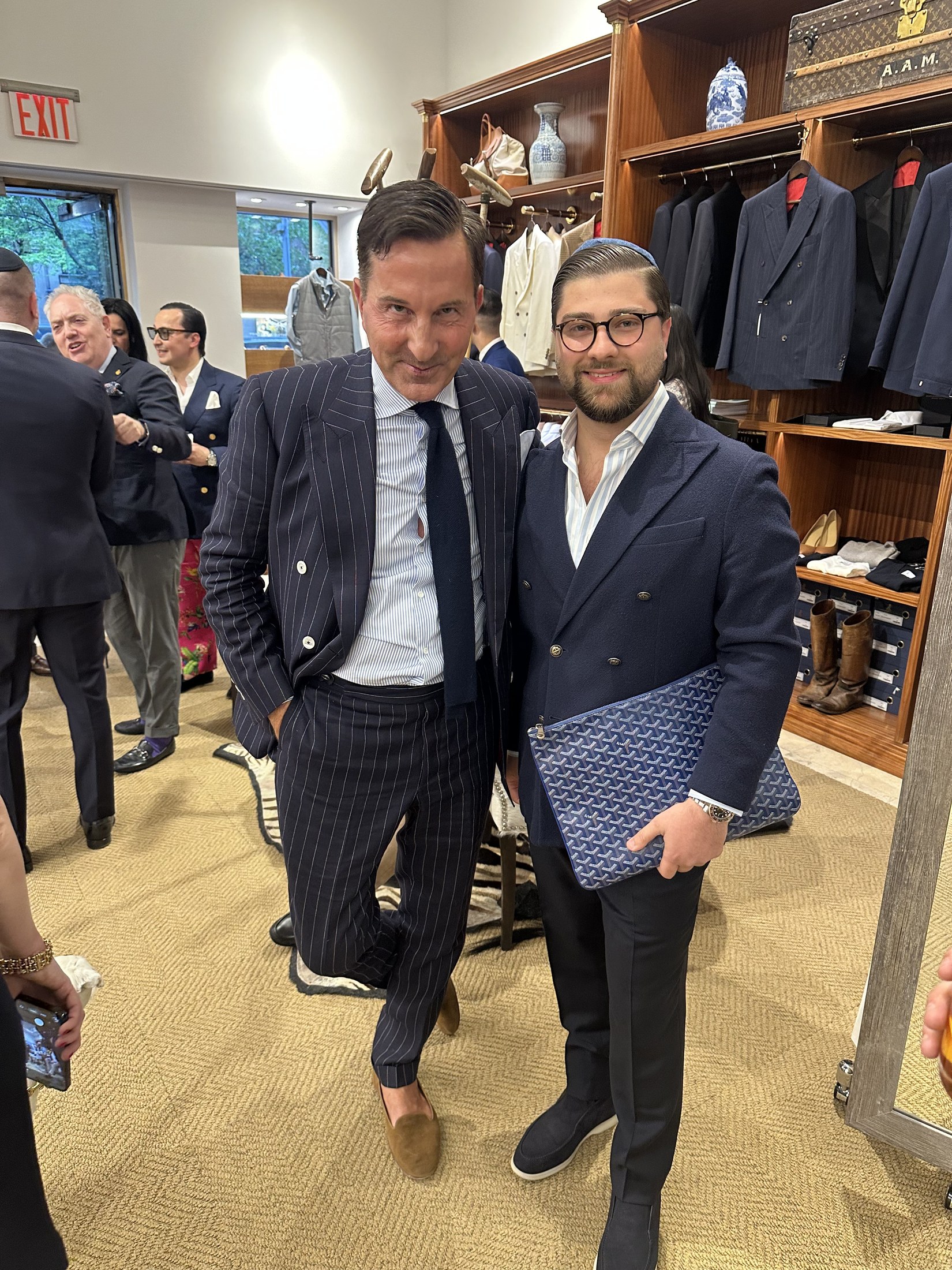 Dani meeting a creative collaborator at a New York tailoring event